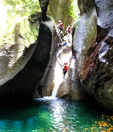 slithering though the middle of a waterfall, photo credit extremedominica.com