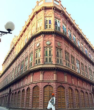 Pushpendra Singh posing in front of Rampuria Haveli by Amrita Das