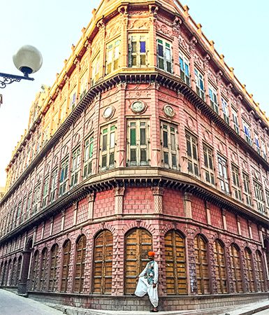 Pushpendra Singh posing in front of Rampuria Haveli