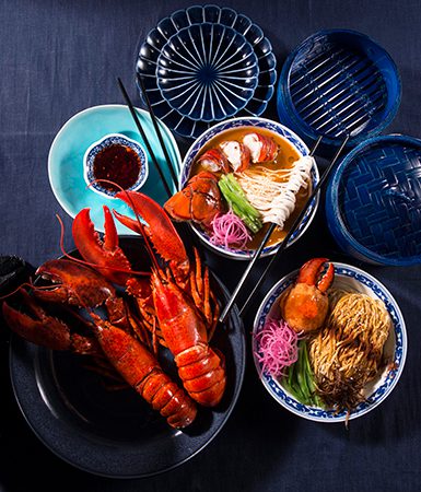 Handmade noodles, shown here with lobster tail, is a speciality of Dragon Noodles Academy