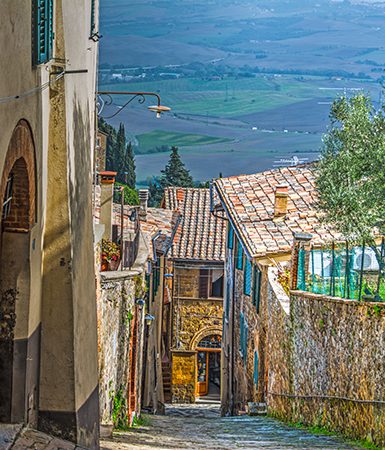 Narrow street in Montalcino by Gabriele Maltinti