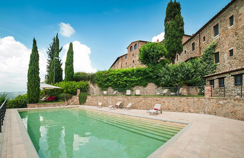 Relax at the end of the day in the pool at Castello Banfi Il Borgo