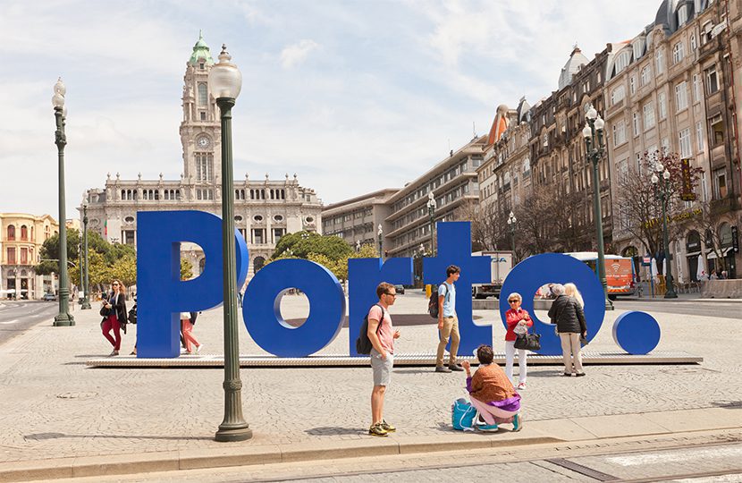 Porto in giant blue letters, the color of the infinite sky blessing the whole of Portugal