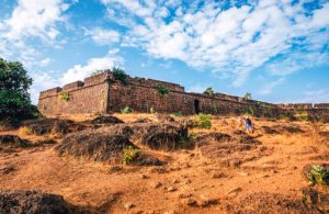 Tourists go to the ruins of Chapora fort, located near Vagator village by Andrei Bortnikau)