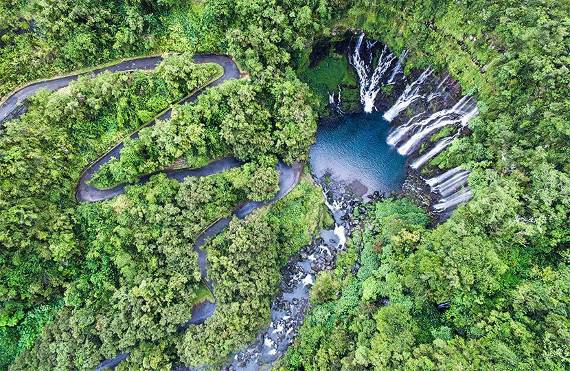 Lush green basins and cascading waterfalls of Réunion by IRT dronecopters