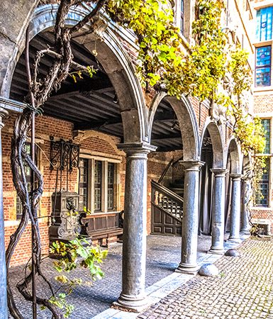 Centuries old courtyard at Museum Plantin-Moretus by Sung Studio