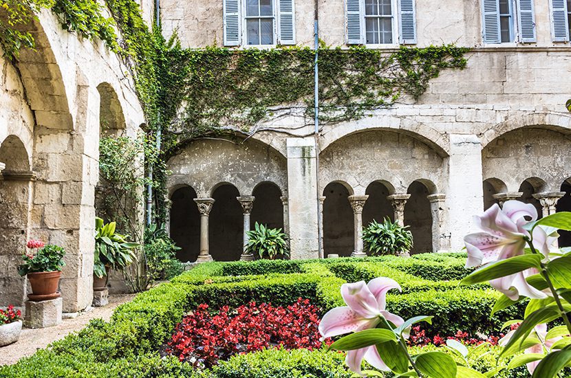 Saint Paul de Mausole, St Remy de Provence. Facade and flower bed of the courtyard in the monaster by Annette Ducasse