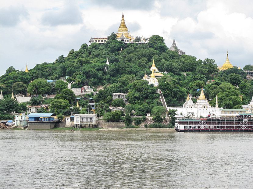 Temple mural; stupas along the river