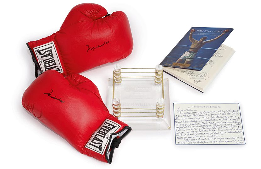 Muhammad Ali Signed Gloves and Award Estimate $1-2,000