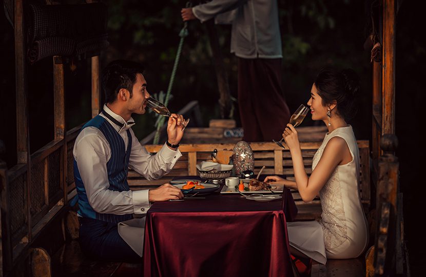 Our favourite way to explore West Lake is aboard a traditional Chinese wooden rowboat