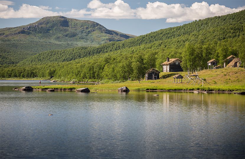 Guenja, the home of Mikael and Anki Vinka, rests under ancient mountains alongside the ancient glacial lake of Lilla-Tjulträsket
