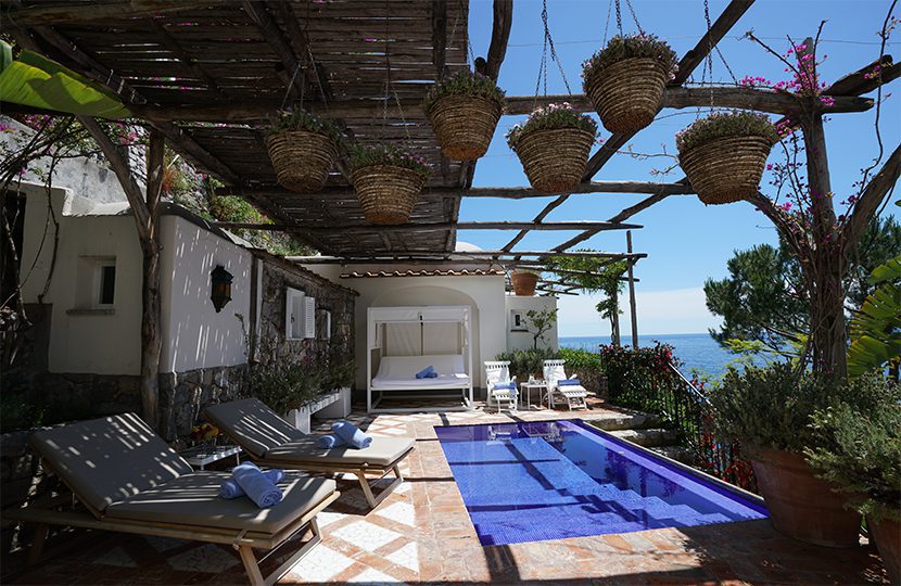 Secret pools outside accent interiors designed by Zeffirelli friend, set designer of stage and screen, Renzo Mongiardino