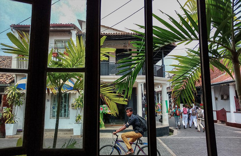 Island life idles by from one of Galle Fort's many cafes