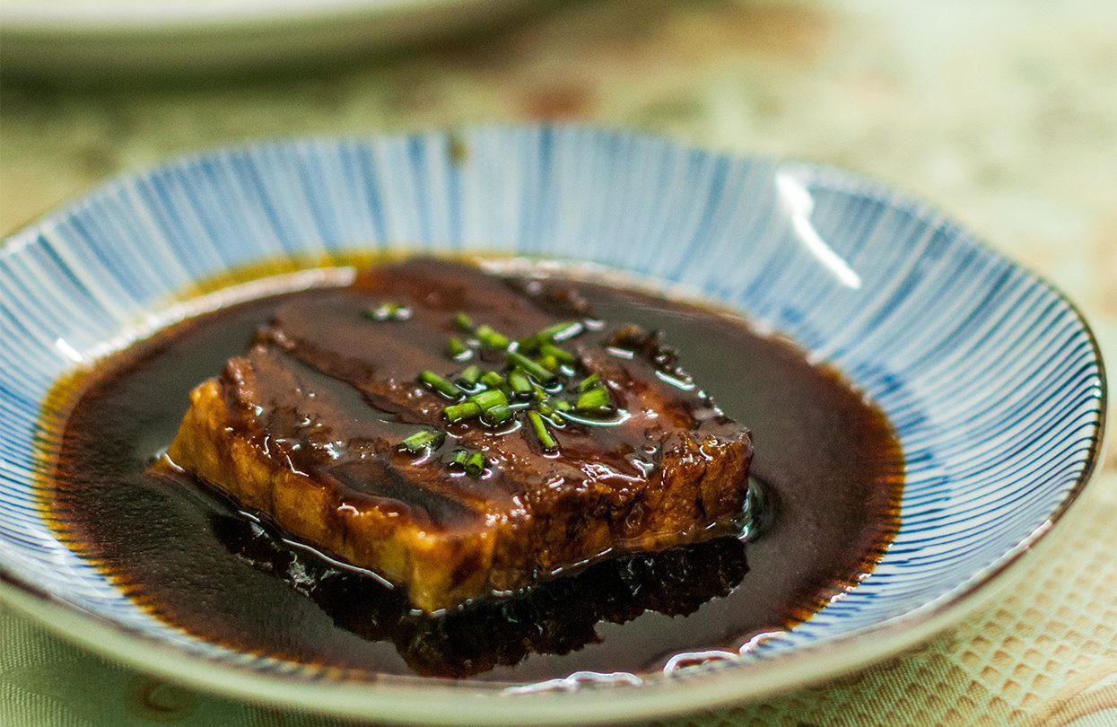 A dish of red cooked pork at the Yu Family home - 