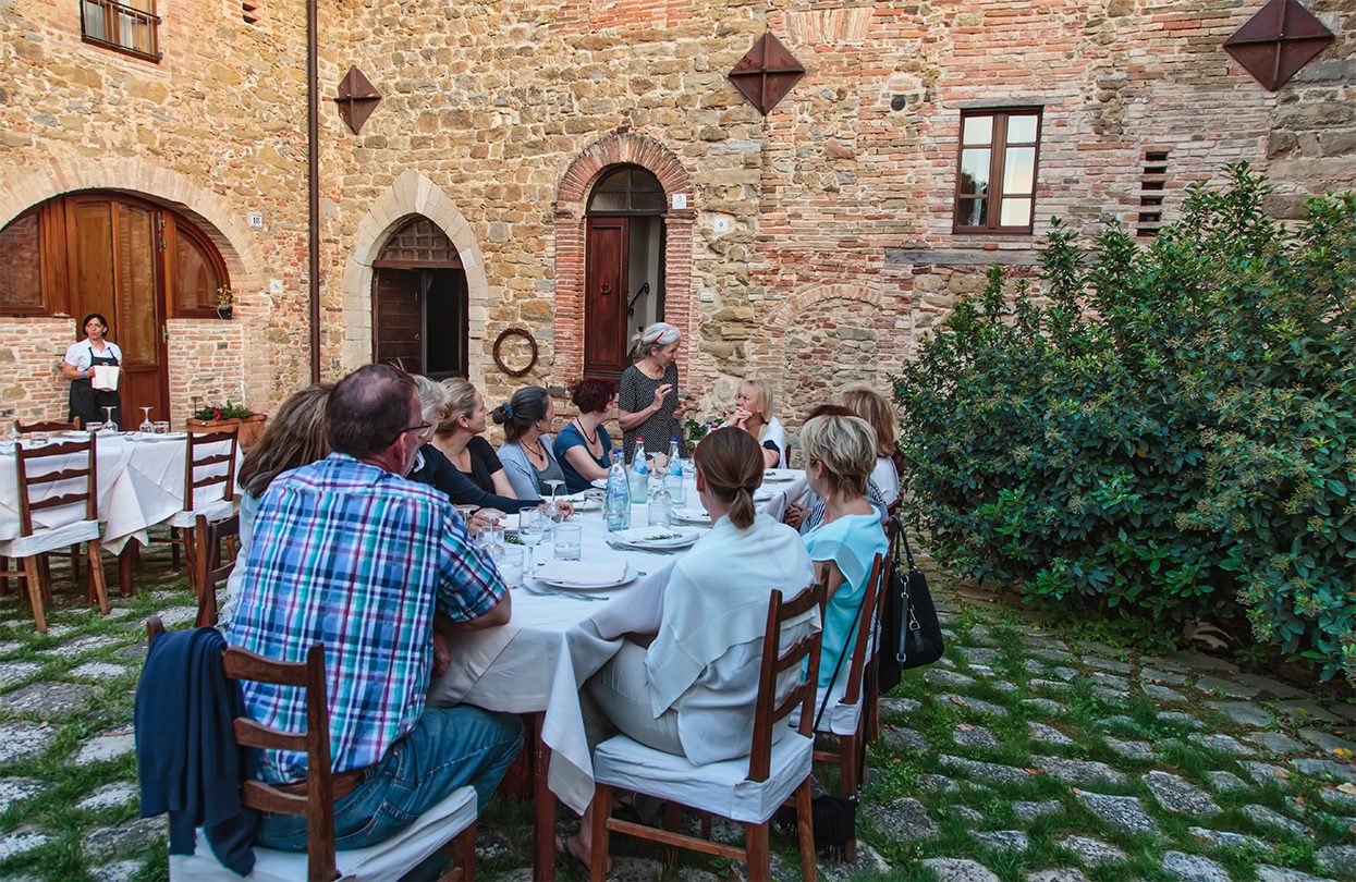 Ellen Krauser hosting dinner at Castello di Monticelli, it’s a grand affair - 
