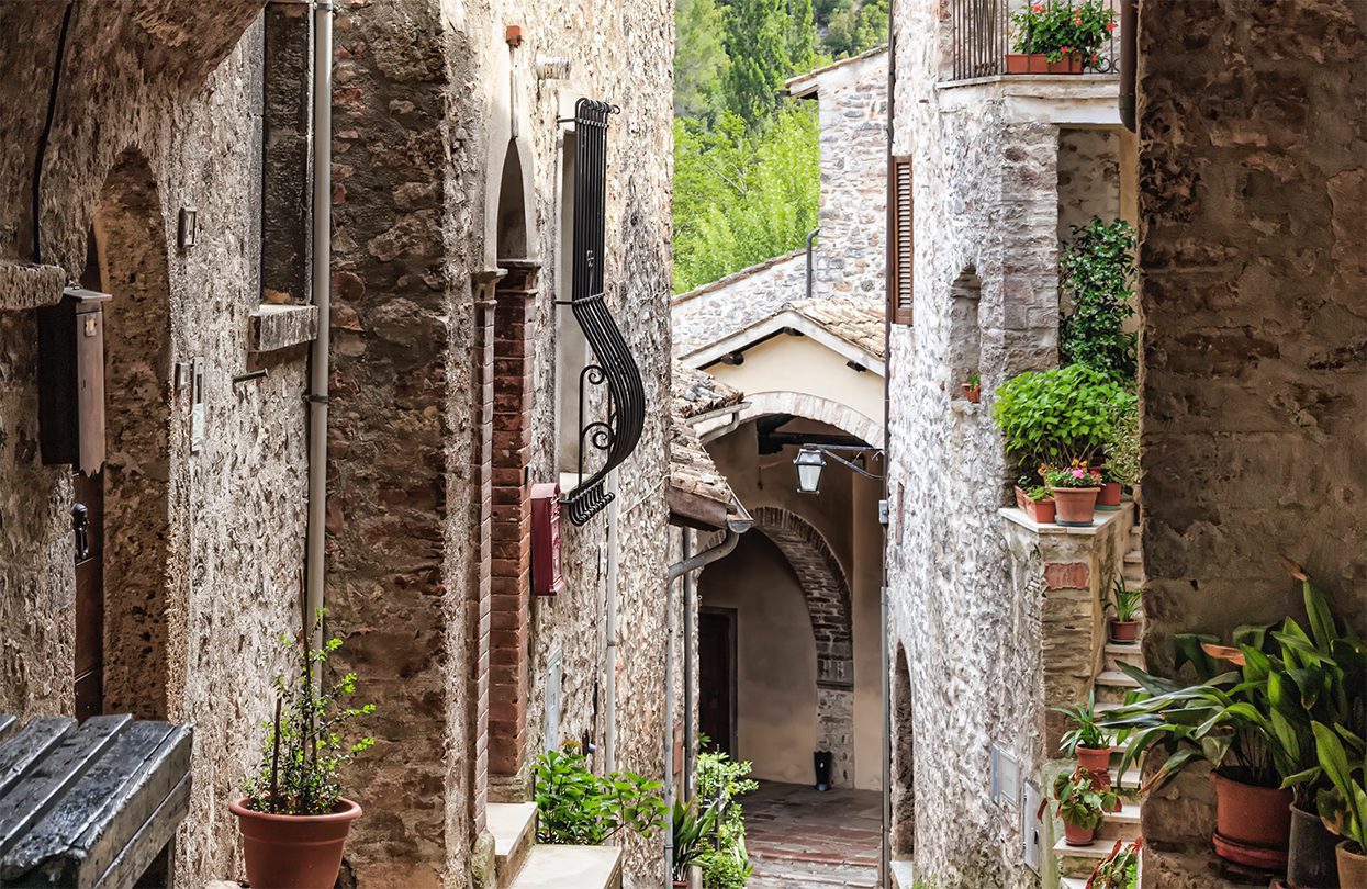 A narrow cobbled alley in the village of Scheggino which clings to a mountain - 