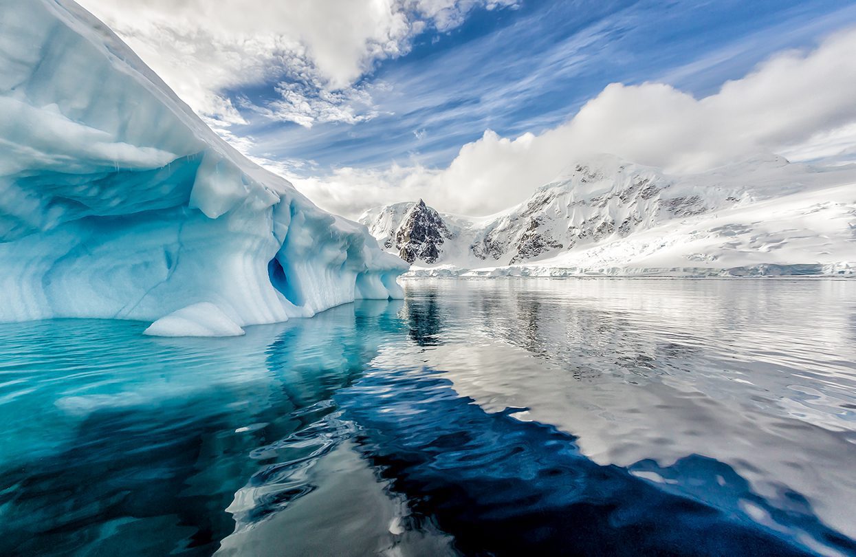 Iceberg floats in Andord Bay on Graham Land by jo Crebbin