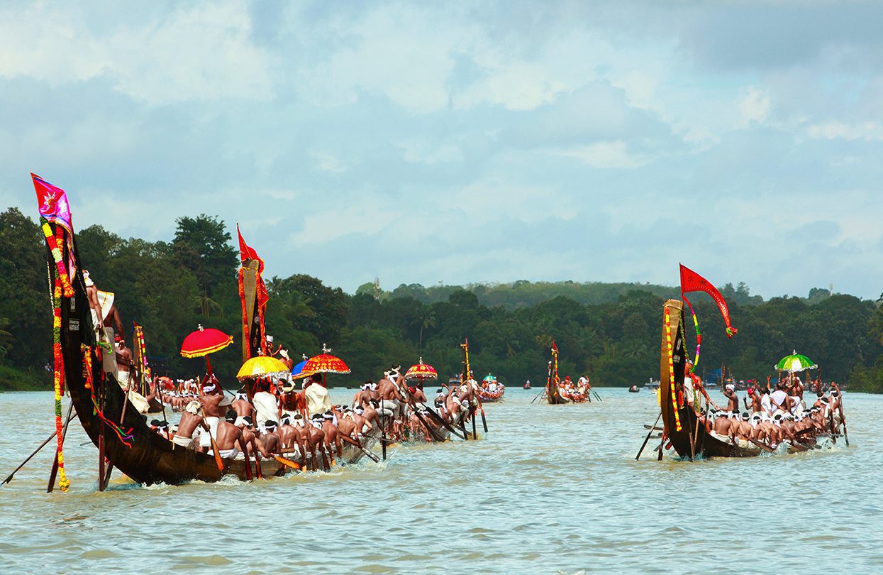 Onam Oarsmen rowing in snake boats participating at aranmula boat race