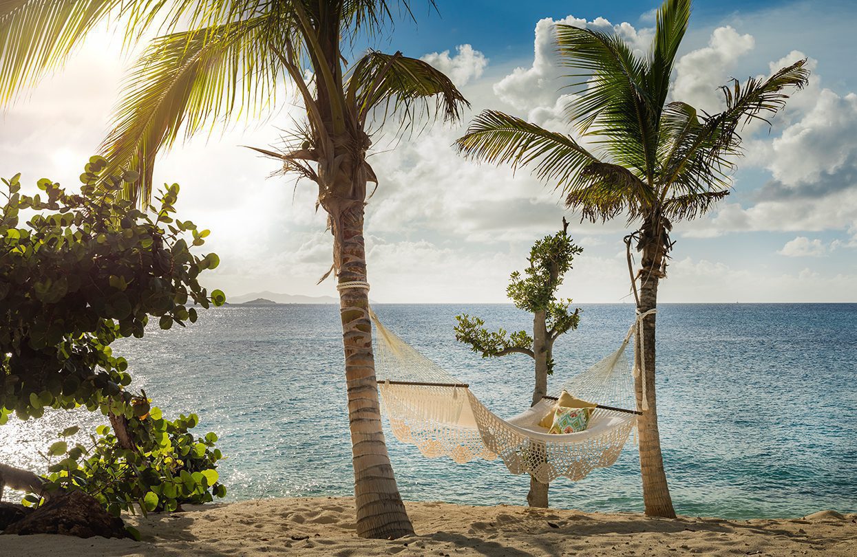Lounge away in a hammock on the beach