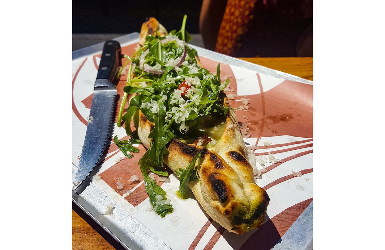 Turkish bread filled with cheese and lamb bacon at Onza, Tel Aviv - Israel