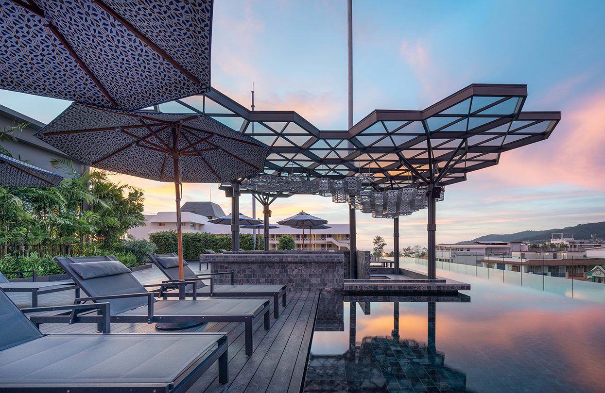 Its abstract rooftop bar overlooks downtown Patong