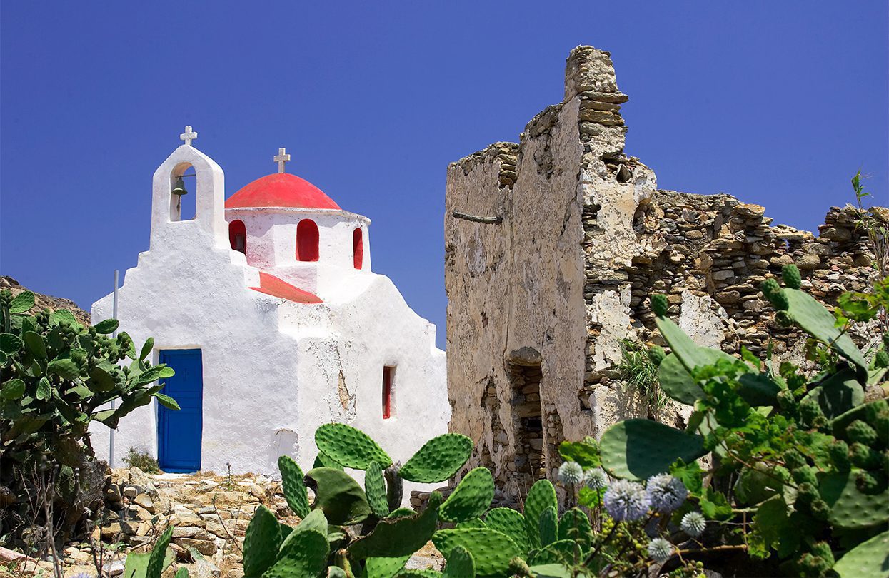 Making a difference with a red dome at the village of Ano Mera in Mykonos