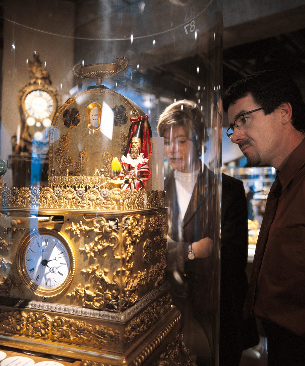 The ‘Musee international d’horlogerie’ in La Chaux- de-Fonds in canton Neuchatel. Pendulum clock with the ‘great magician’, around 1830, Switzerland Tourism - Peter Maurer