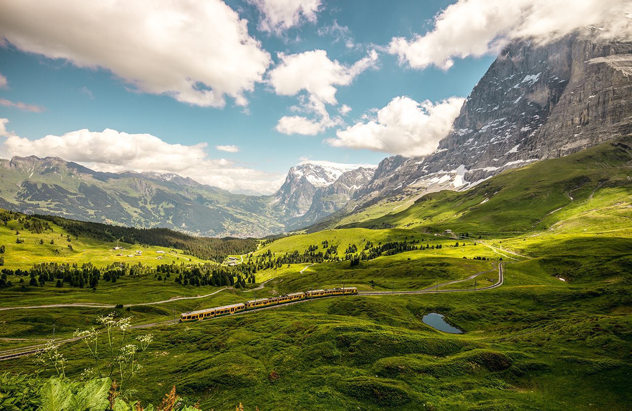 On the Kleine Scheidegg with a view to Grindelwald. The Jungfraubahn in front of the Eiger North Face, Switzerland Tourism