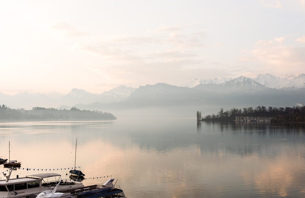 The Alps peek over the banks of Lake Lucerne