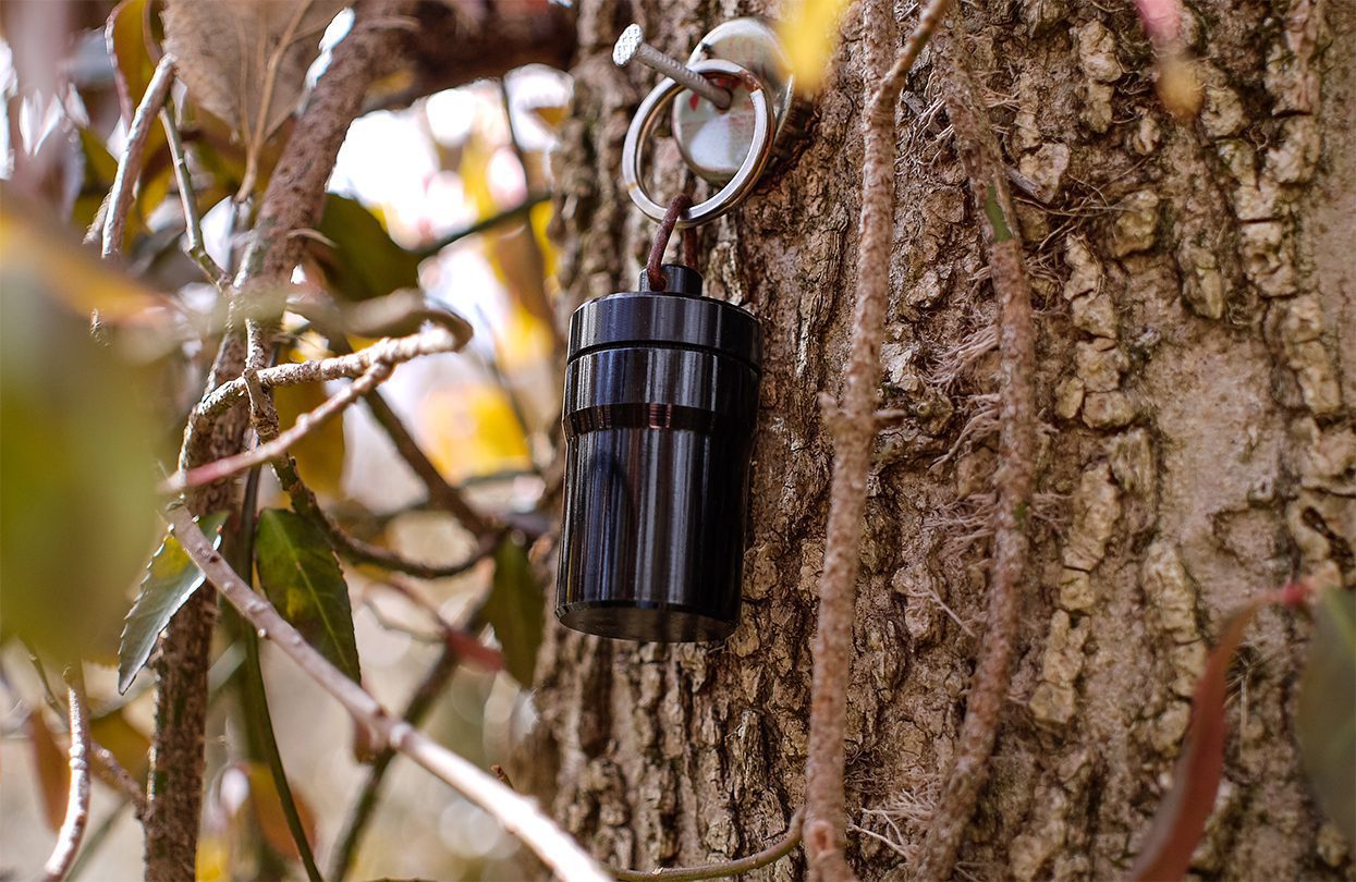 Small Geocache hanging on a tree, photo by photocrazed_jls