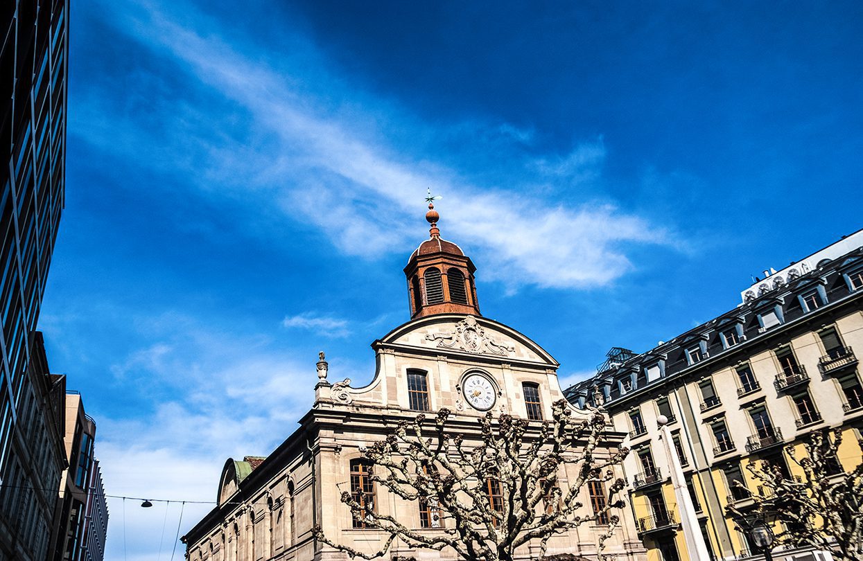 Brilliant blue skies make for excellent walks along Geneva’s historic buildings