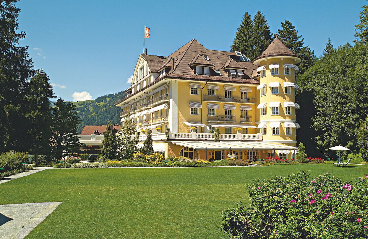 Gstaad’s Le Grand Bellevue pale yellow and white facade of the time- honored building