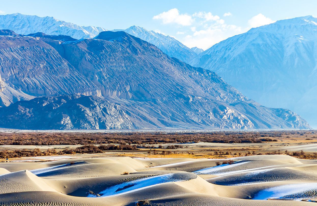 There are stunning silver sand dunes of Hunder in the Nubra Valley region (image by Ultimate Travel Photos)