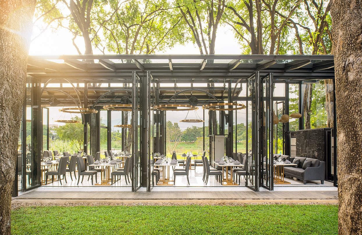 A dramatic glass structure houses Oxygen Dining Room