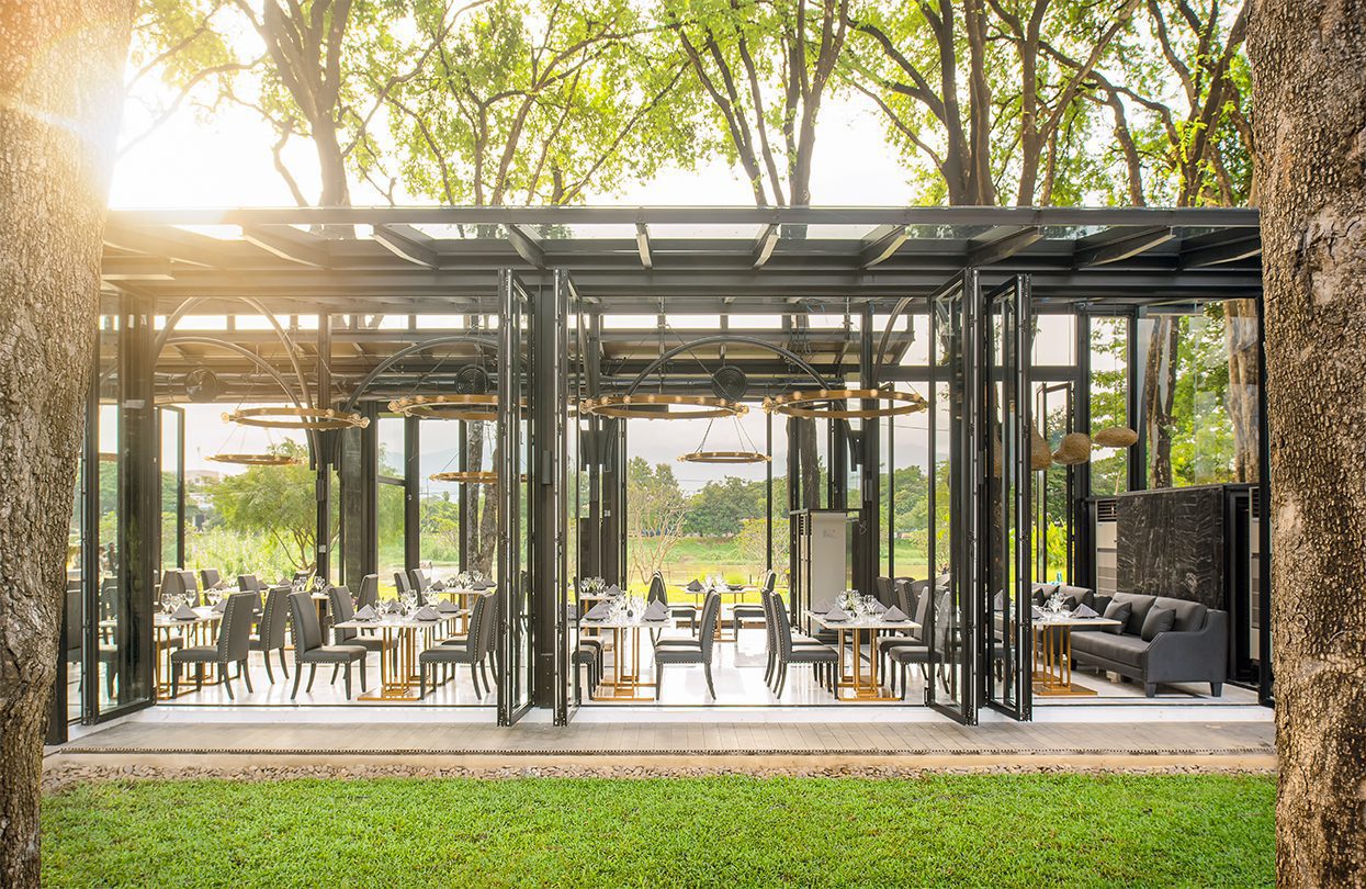 A dramatic glass structure houses Oxygen Dining Room