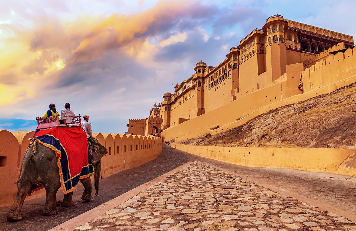 Tourists enjoy an elephant ride at Amer Fort Jaipur, by Roop_Dey