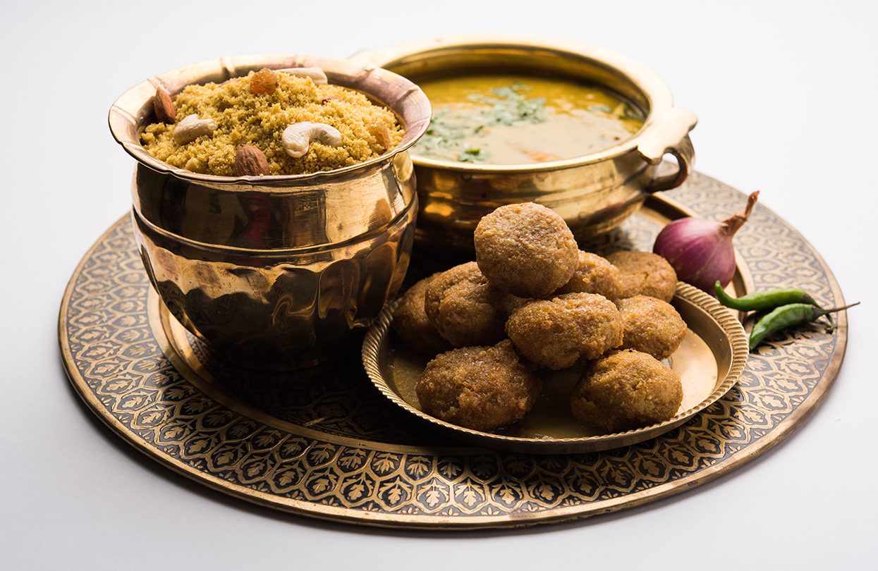 Daal Baati Churma is a popular cuisine from Rajasthan, by StockImageFactory.com