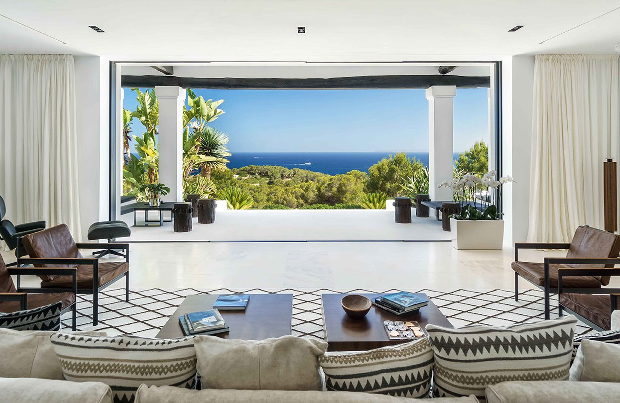 Open-plan living space with sweeping ocean view Can Alegre