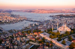 Aerial view of Istanbul at sunset with Blue mosque on the right by murattellioglu