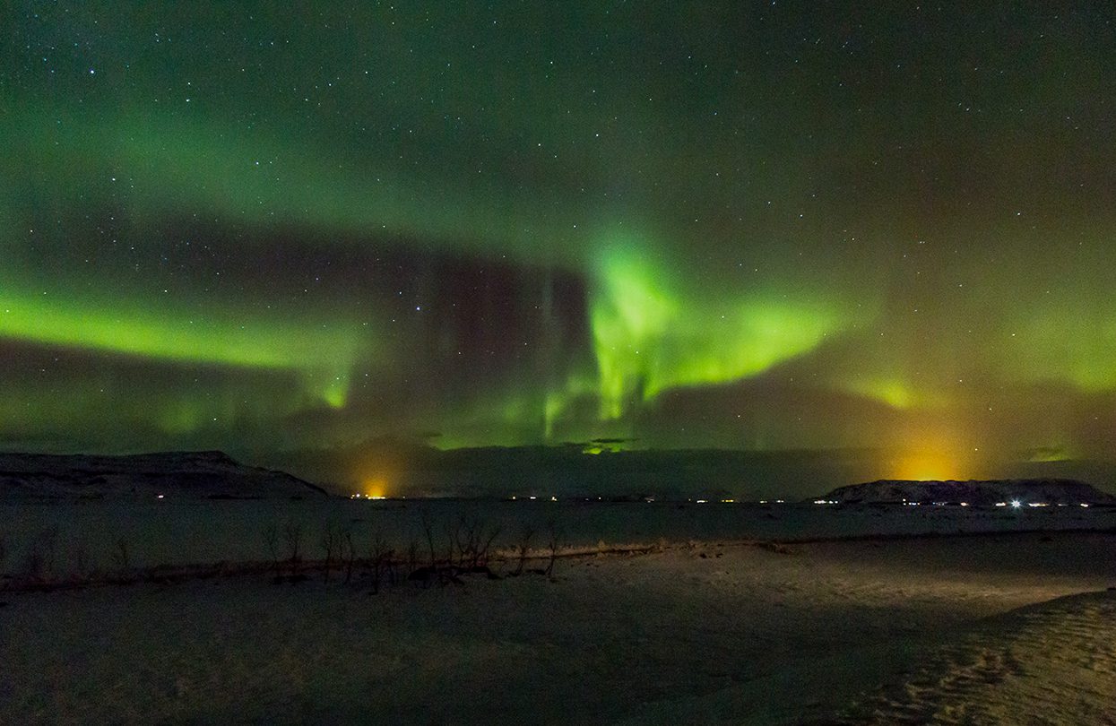 We watched the Northern Lights, a grey-green strip of light materialising across the sky