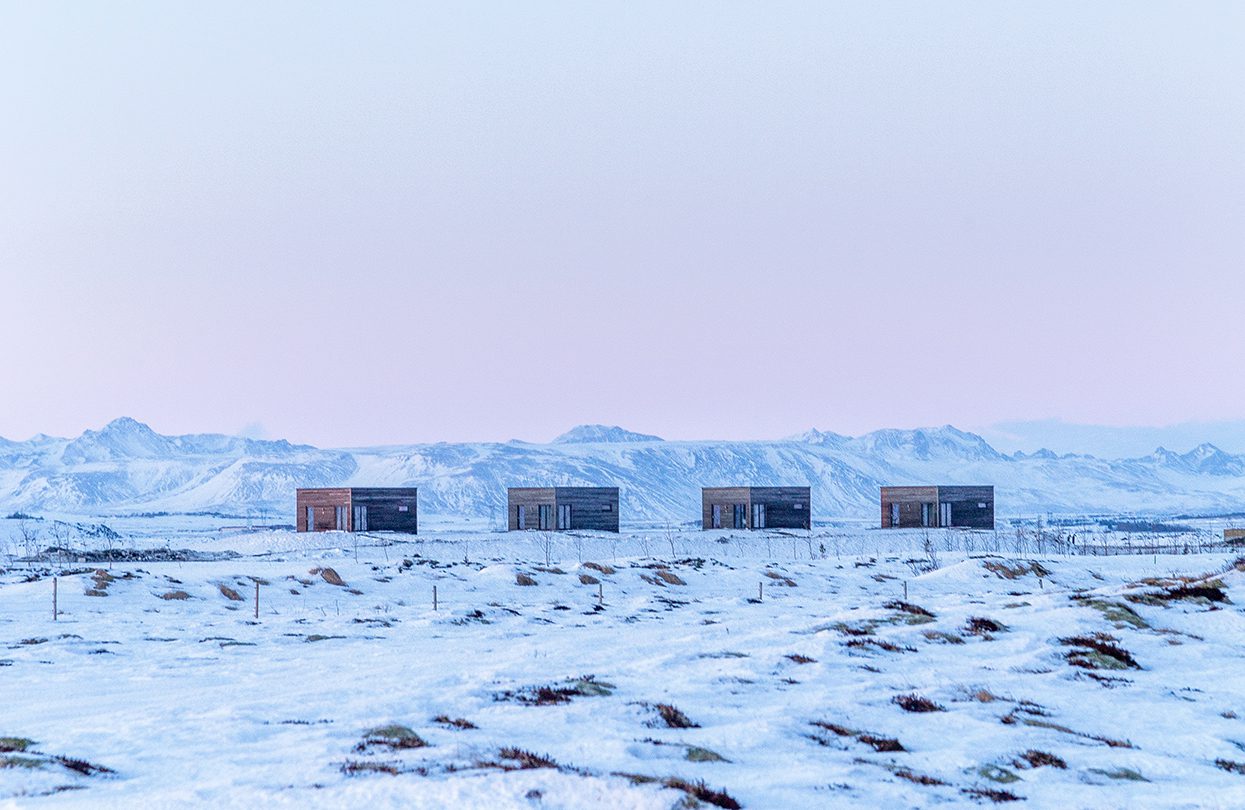 A magnificent sunset of pink and purple hues from our cabins at Heima