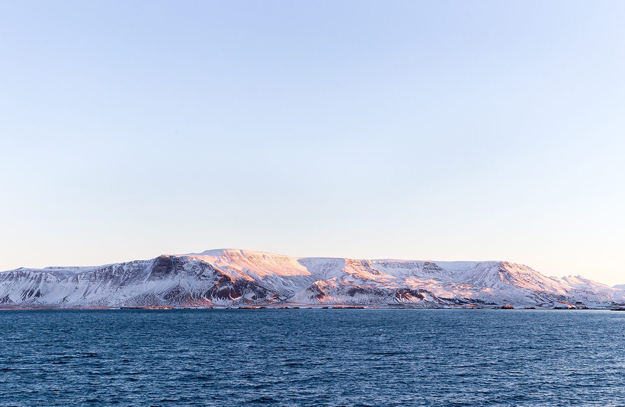 Watching the sunrise from the shores of Reykavik Lake