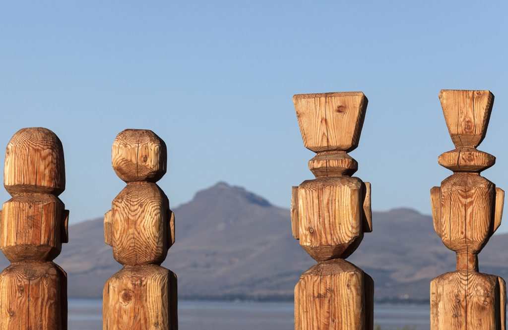 Four statues by Nahuel Huapi Lake in Bariloche, Argentina, image by Henryk Sadura