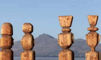 Four statues by Nahuel Huapi Lake in Bariloche, Argentina, image by Henryk Sadura