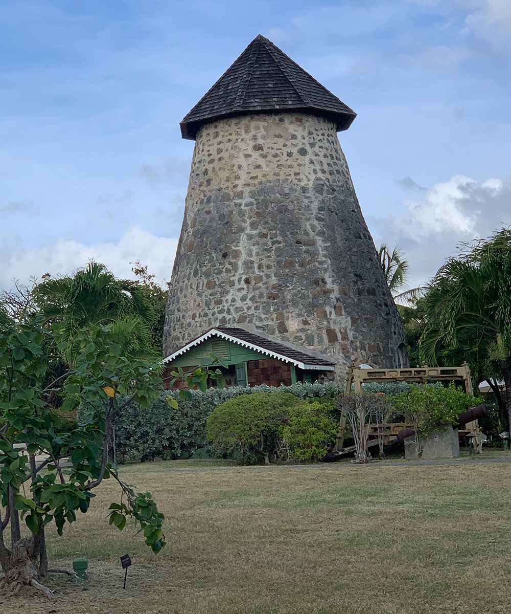 The Cotton House was converted from an old warehouse to a 17-room hotel. Shown here is the Old Sugar Mill that serves as a museum