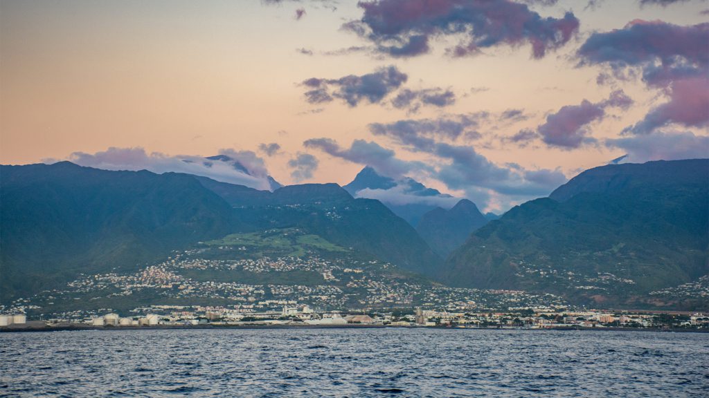 Réunion as viewed from a catamaran at sunset