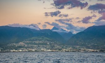 Réunion as viewed from a catamaran at sunset