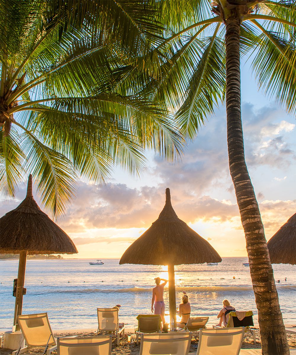 The national flag of Mauritius represents the Flamboyant Tree in red, the Indian Ocean in blue, the sunshine in yellow, and the vegetation of the island in green