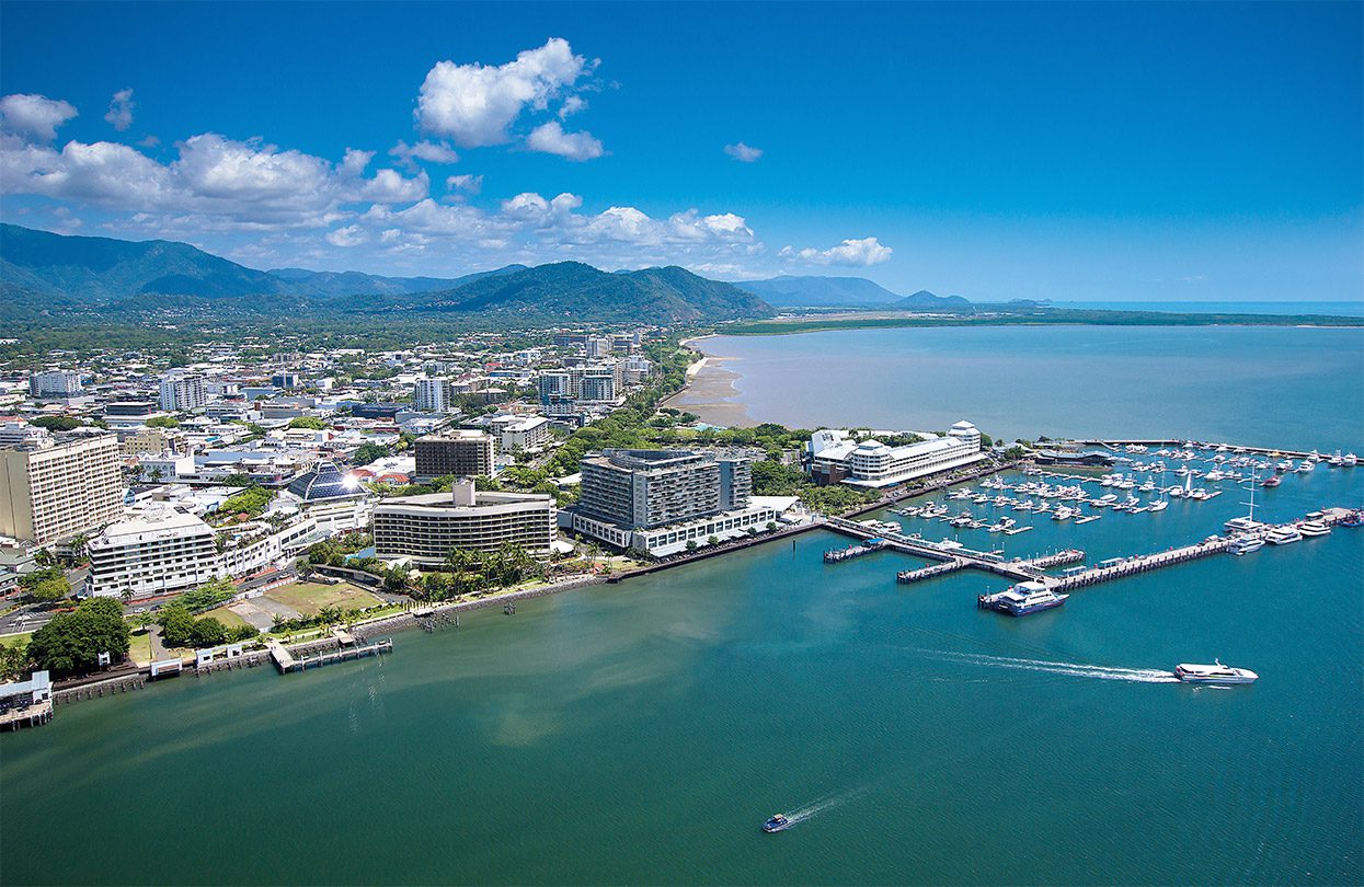 The city of Cairns hugs the coast of Tropical North Queensland, photo by Tourism & Events Queensland