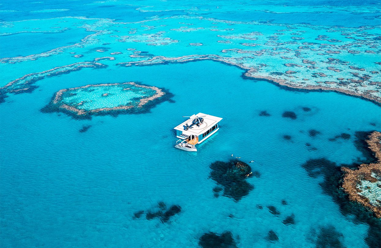 Helicopter flights offers visitors the ultimate scenic perspective of the reef, photo by Tourism and Events Queensland